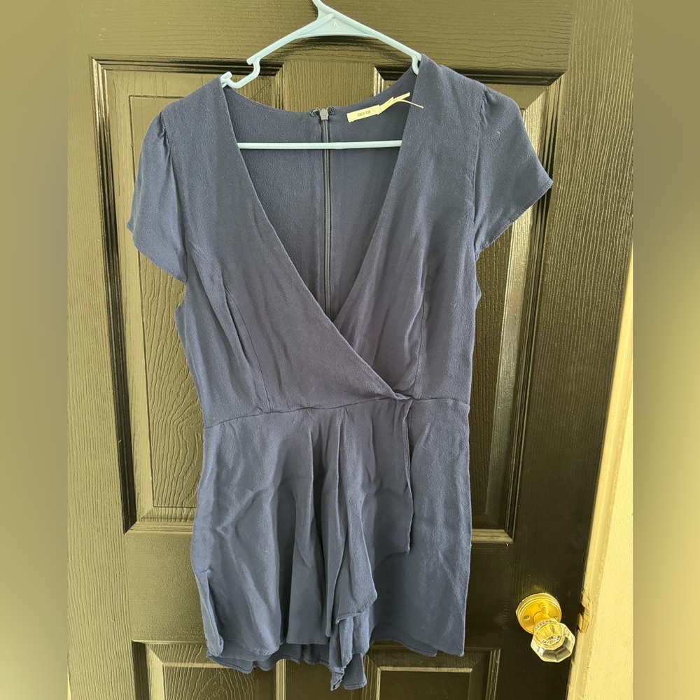 Urban outfitters Kimchi Blue Romper. Shorts with back zip.  Size Med.
